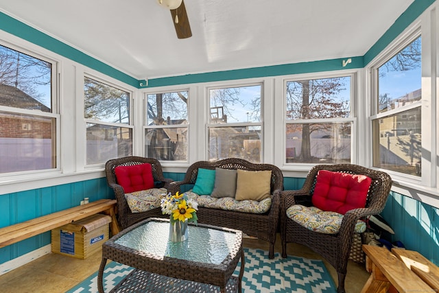 sunroom / solarium with ceiling fan