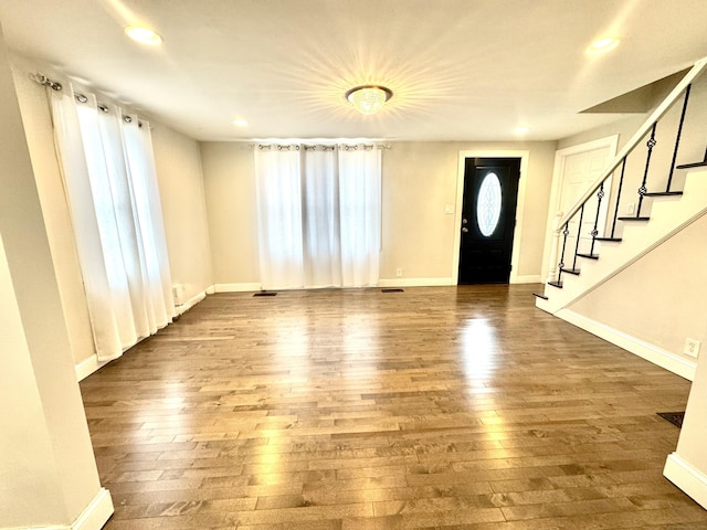 entrance foyer with hardwood / wood-style flooring