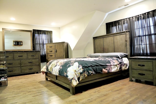 bedroom featuring light wood-type flooring