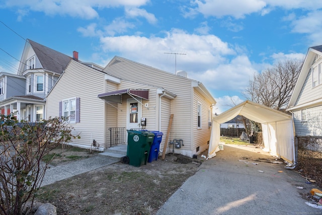 view of front of house featuring a carport