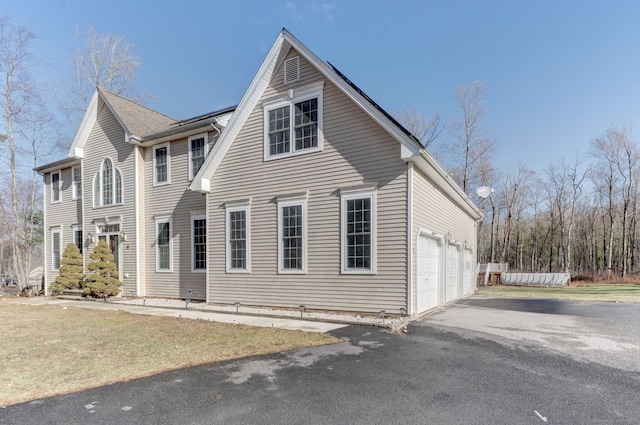 exterior space featuring a garage