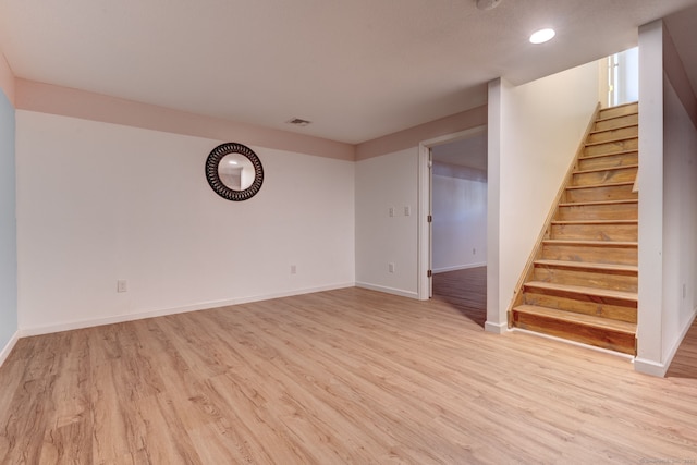 unfurnished room featuring light hardwood / wood-style flooring