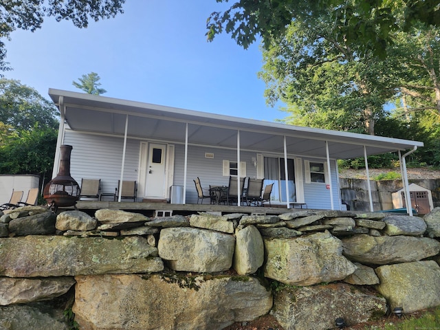 view of front of property featuring a patio