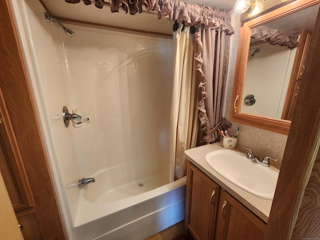 bathroom featuring shower / bathtub combination with curtain and vanity