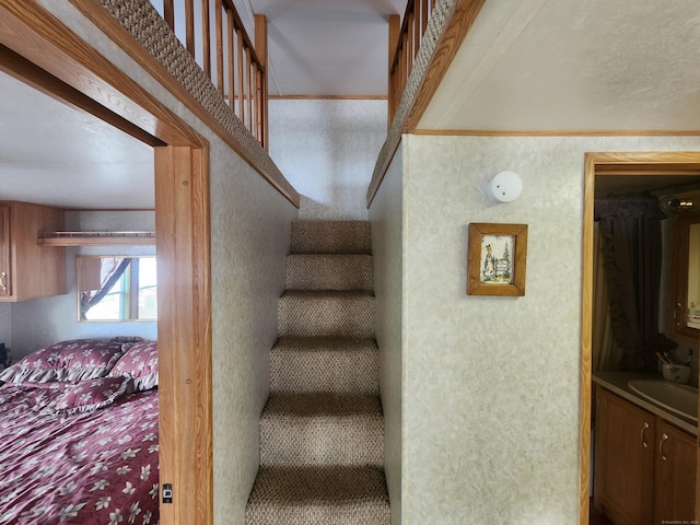 staircase with sink