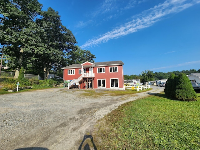 view of front of property with a front yard