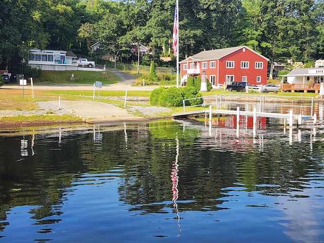 view of dock with a water view