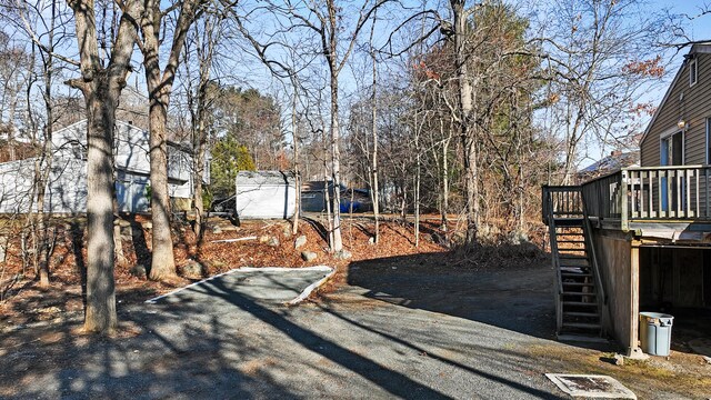 view of yard featuring a deck