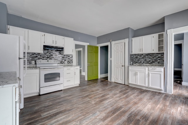 kitchen with white appliances, white cabinetry, and extractor fan