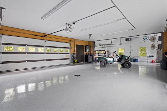 garage featuring a garage door opener