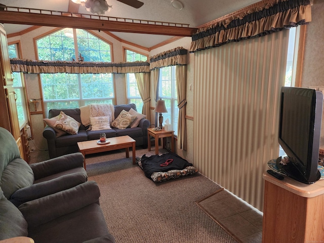 living room featuring lofted ceiling with beams and ceiling fan