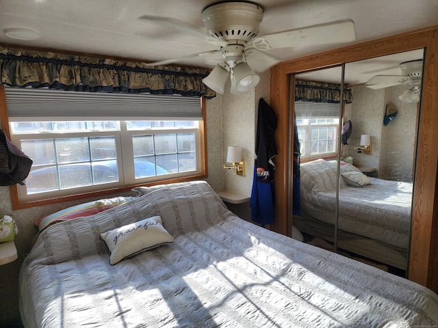 bedroom featuring a closet and ceiling fan