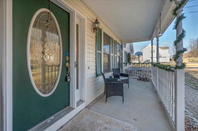 balcony featuring a porch