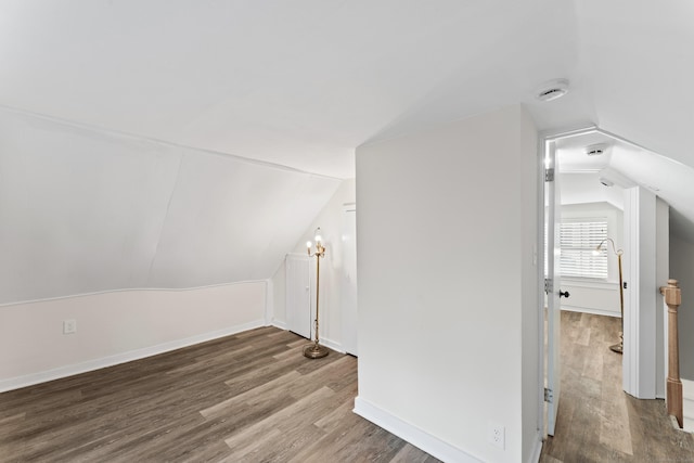 bonus room featuring hardwood / wood-style floors and lofted ceiling