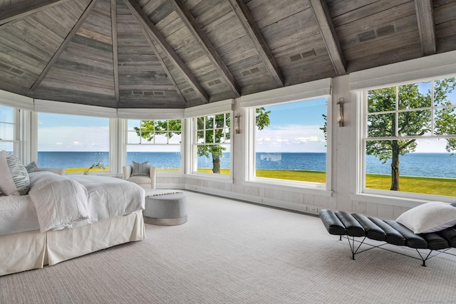 sunroom / solarium featuring vaulted ceiling with beams, wooden ceiling, a water view, and visible vents