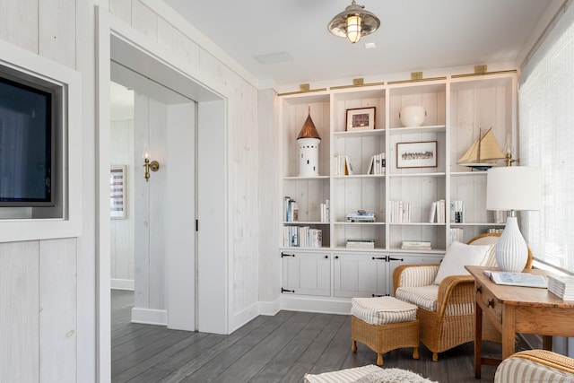 living area with dark wood-style flooring