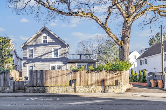 view of property exterior with a balcony