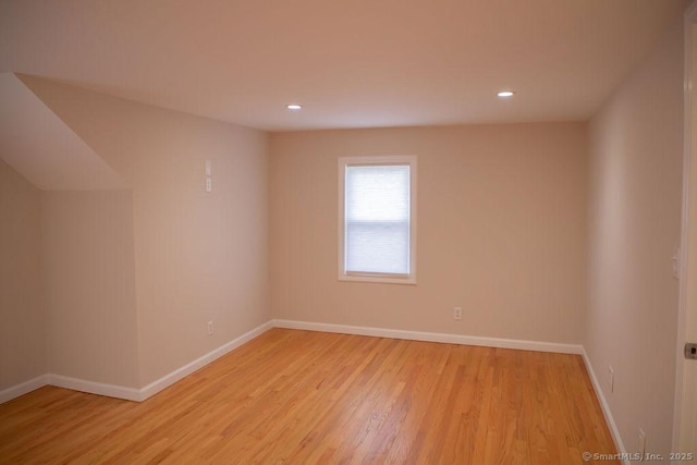 unfurnished room with light hardwood / wood-style flooring