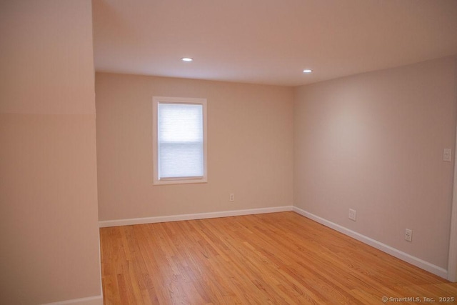 empty room featuring light hardwood / wood-style floors