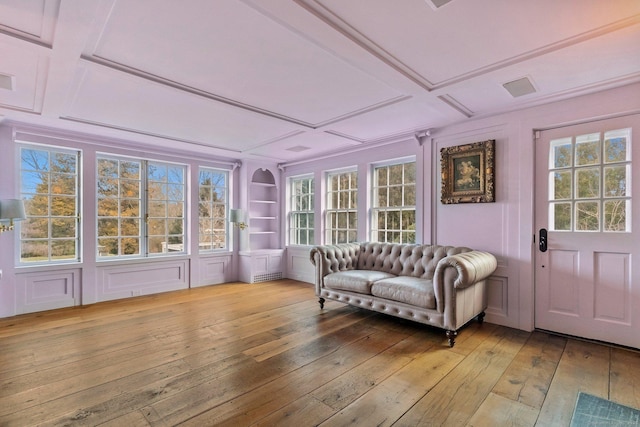 sunroom featuring coffered ceiling