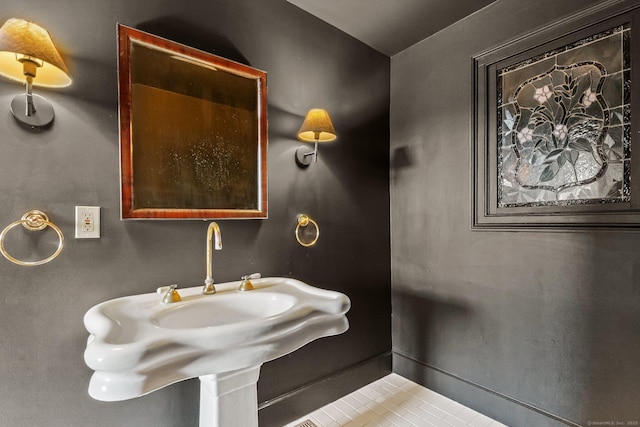 bathroom featuring tile patterned floors and sink