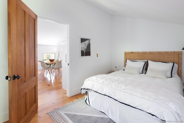 bedroom with light wood finished floors