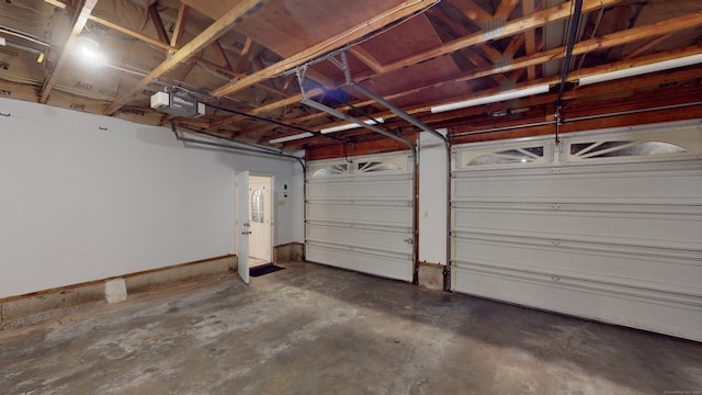 garage featuring a garage door opener