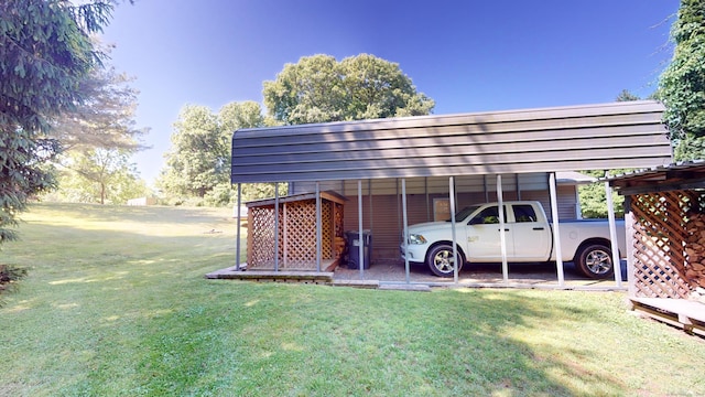 view of parking / parking lot with a lawn and a carport