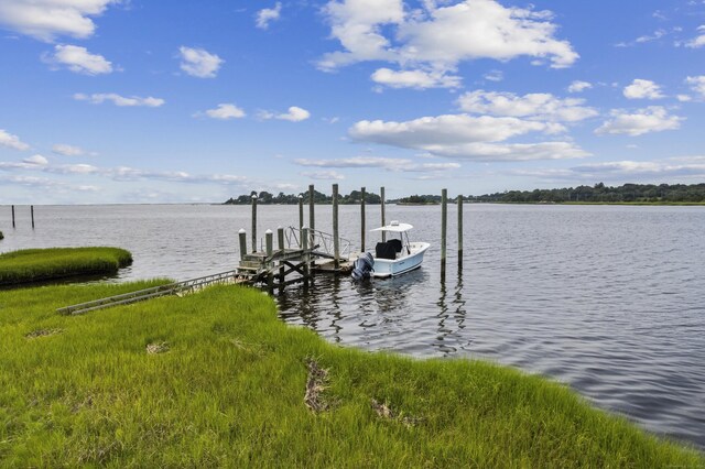 view of dock with a water view