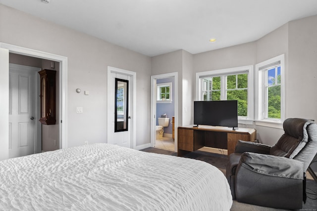 bedroom featuring ensuite bath