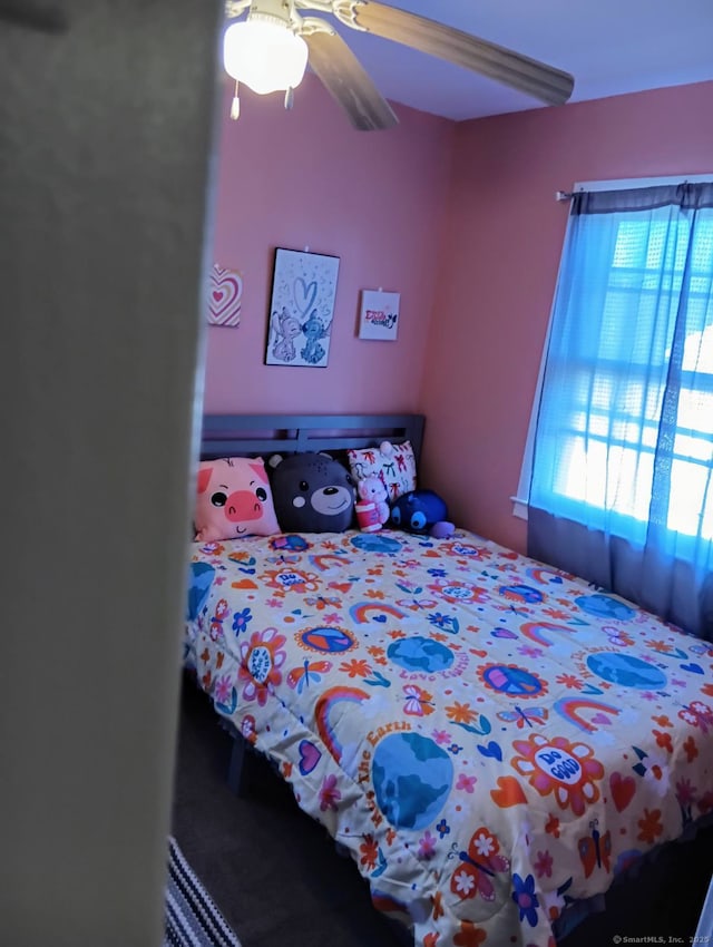 bedroom featuring ceiling fan