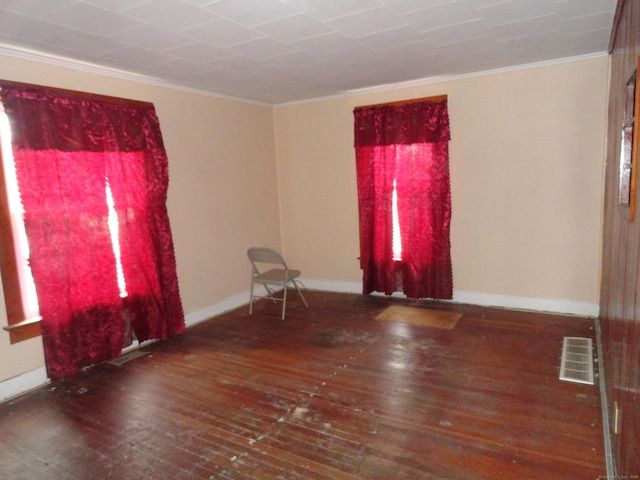 39 Baker St, Winchester, CT 06098 - spare room with dark hardwood / wood-style flooring and crown molding