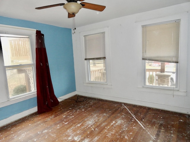39 Baker St, Winchester, CT 06098 - empty room featuring dark hardwood / wood-style flooring and ceiling fan