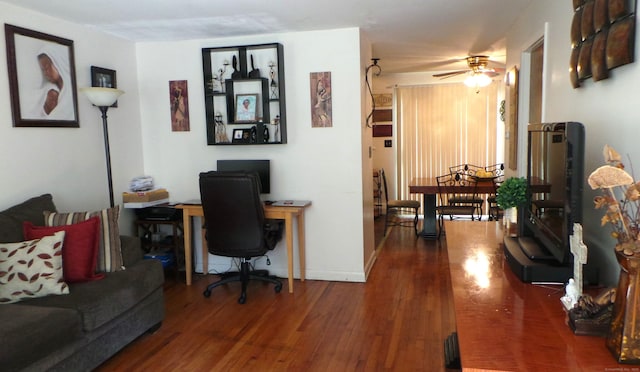 office space featuring hardwood / wood-style floors and ceiling fan