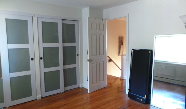 unfurnished bedroom featuring hardwood / wood-style floors