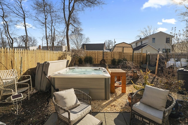 view of patio featuring a hot tub