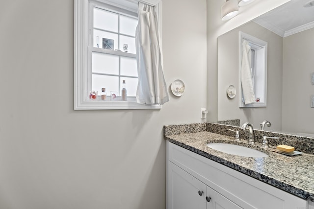 bathroom with vanity and crown molding