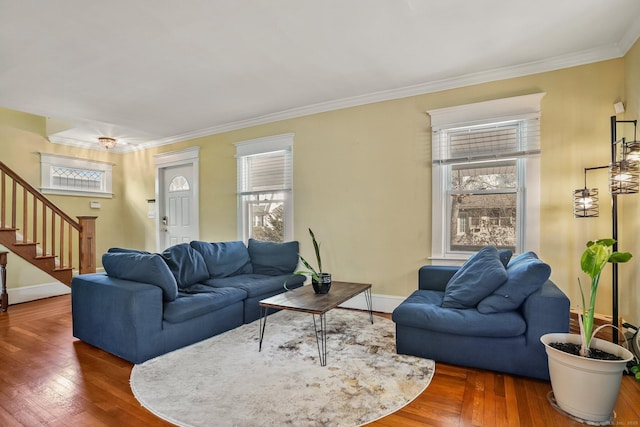 living room featuring plenty of natural light, dark hardwood / wood-style flooring, and crown molding