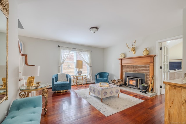 living room featuring hardwood / wood-style floors and baseboard heating