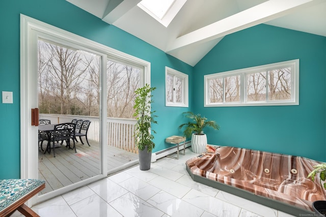 interior space with lofted ceiling with skylight and a baseboard radiator