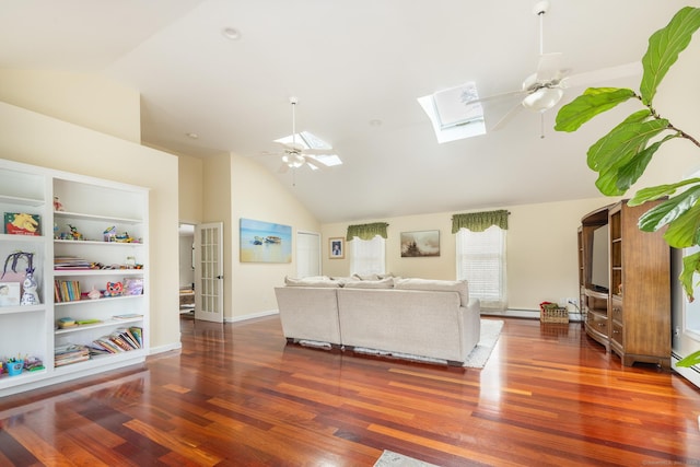 unfurnished living room with built in features, lofted ceiling with skylight, ceiling fan, and dark wood-type flooring