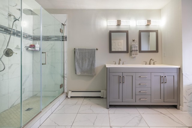 bathroom with walk in shower, vanity, and a baseboard heating unit