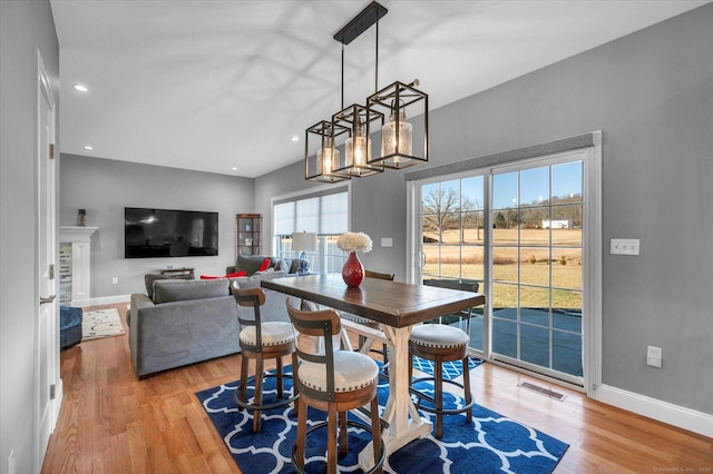 dining area featuring light wood-type flooring