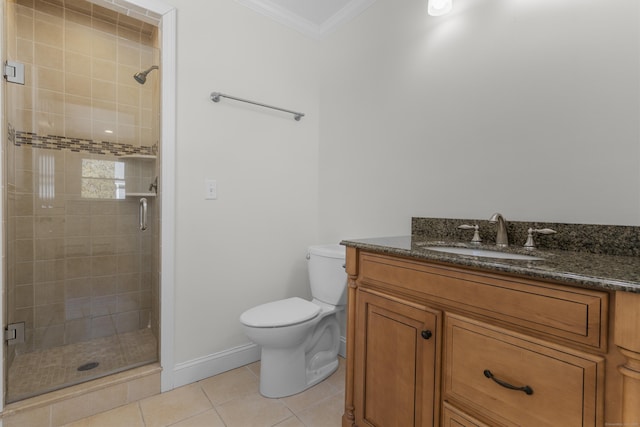 full bath featuring vanity, tile patterned flooring, a shower stall, crown molding, and toilet