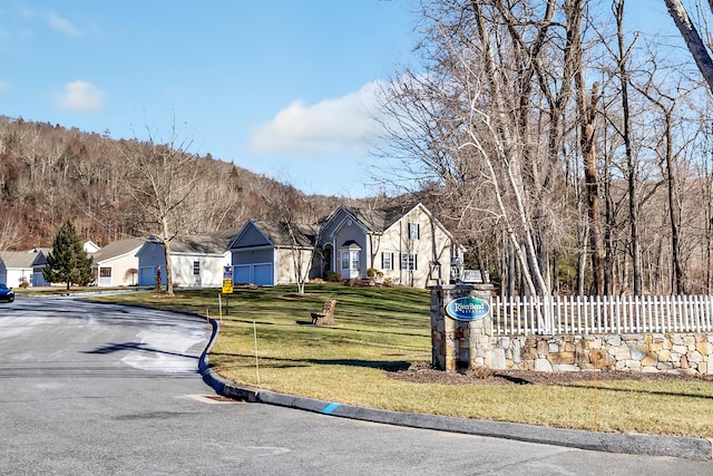 view of front of home with a front lawn