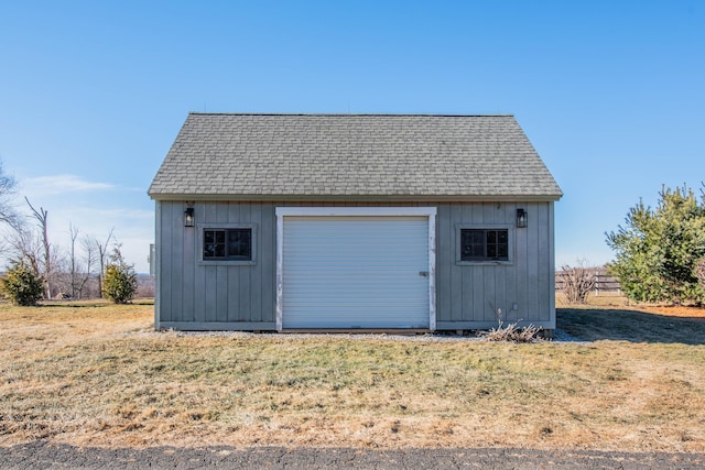 garage with a yard