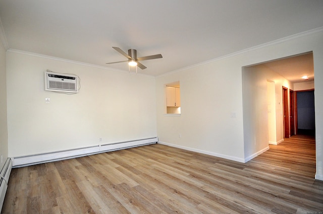 empty room with a wall unit AC, ornamental molding, ceiling fan, a baseboard heating unit, and light hardwood / wood-style flooring