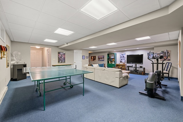 playroom featuring a drop ceiling and carpet floors