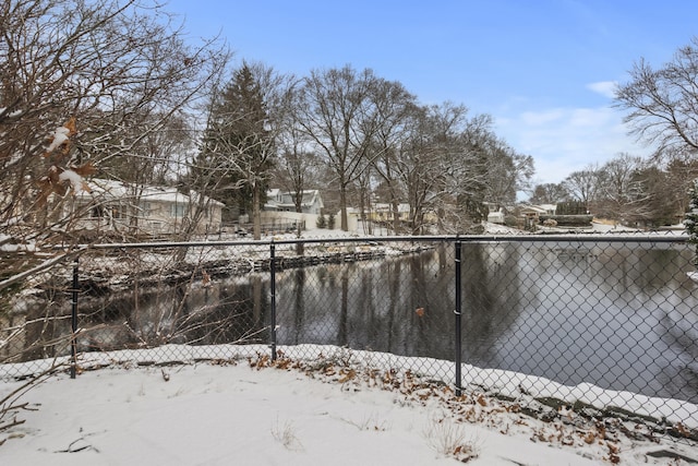 view of yard covered in snow