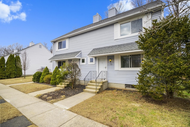 view of front of house with a front yard